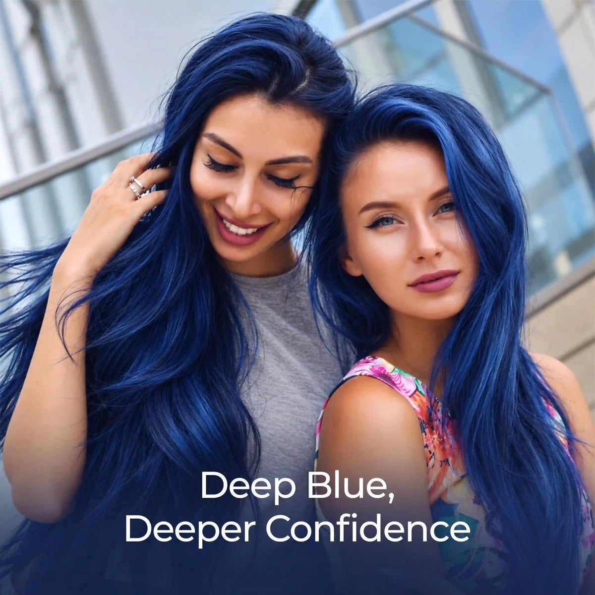 Two women showcasing vibrant, silky deep blue hair with a smooth, glossy finish, highlighting the bold and stylish results of StayMyx Deep Blue Hair Color.